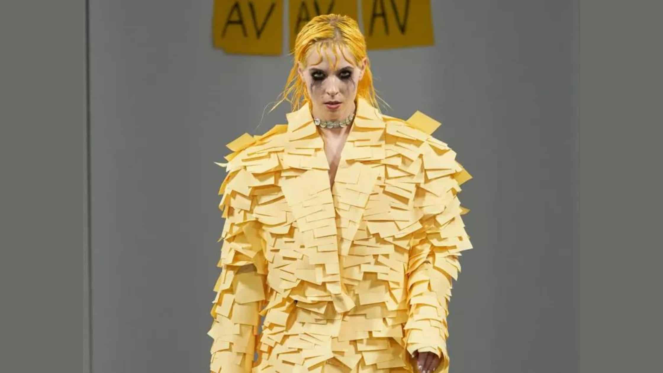 super model wearing an outfit made out of post-it notes